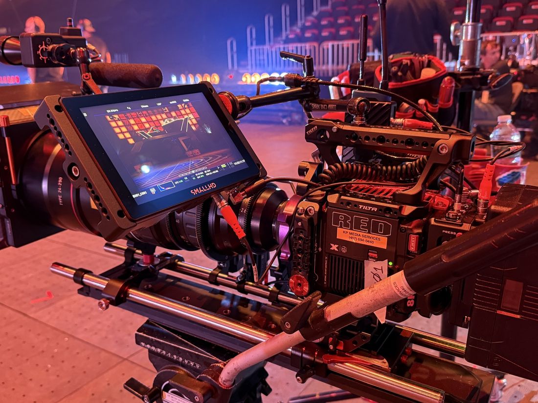 RED cinema camera rig tagged KP Media Services on a live event set